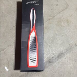 Stainless Steel Hand Grater with Red Accents